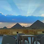 Hussien Lotus Pyramids View