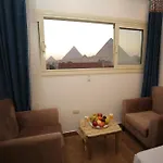 Hussien Lotus Pyramids View