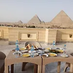 Hussien Lotus Pyramids View