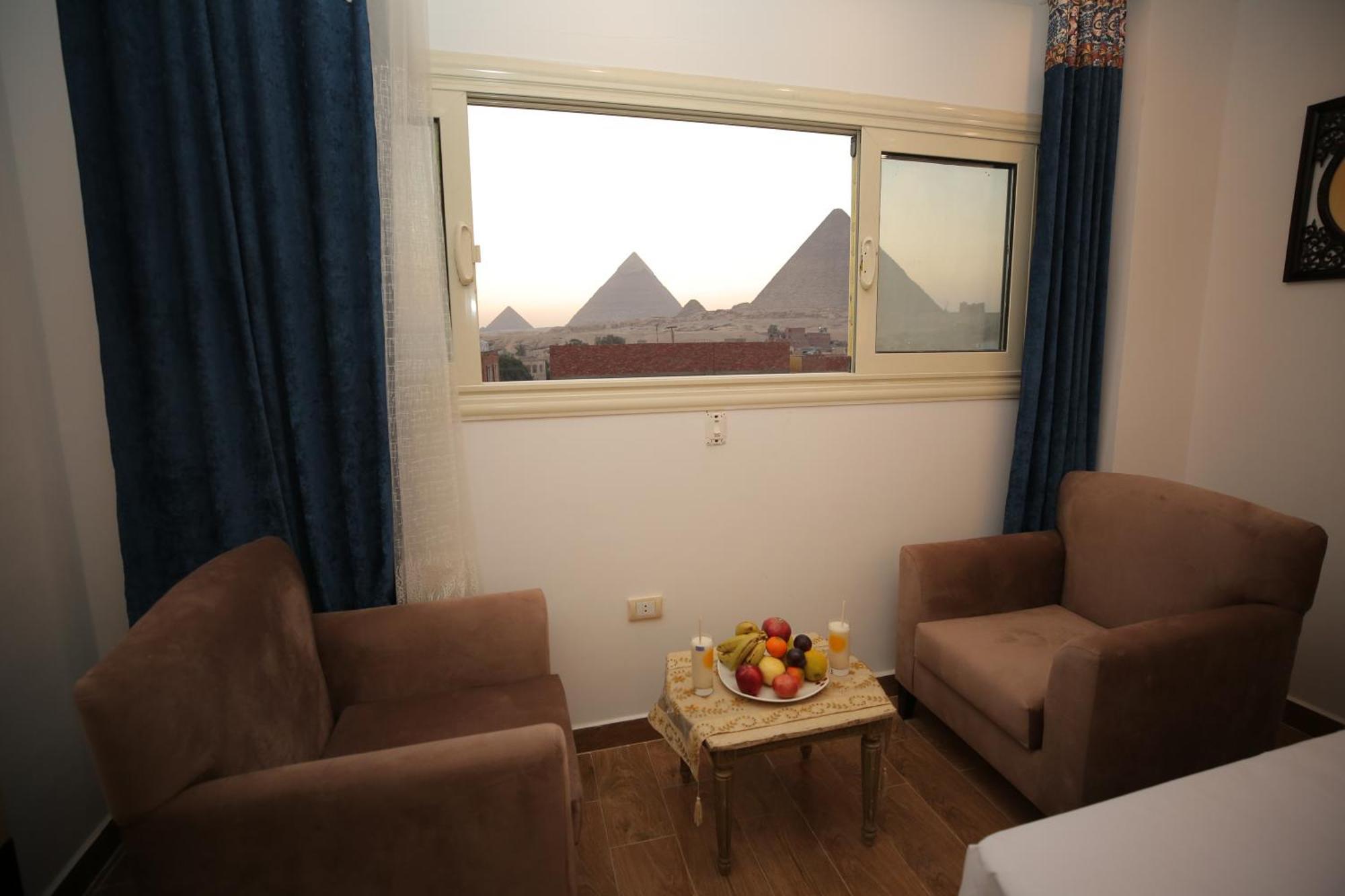 Hussien Lotus Pyramids View 3*