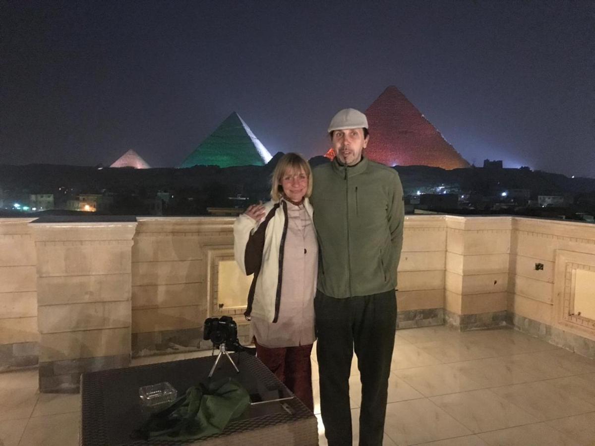 Hussien Lotus Pyramids View