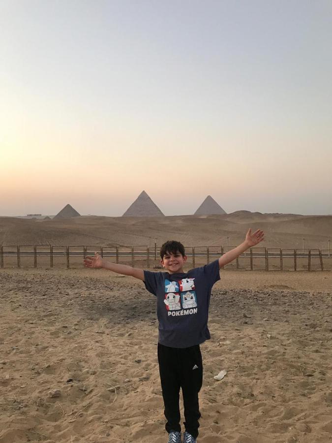 Hussien Lotus Pyramids View Cairo